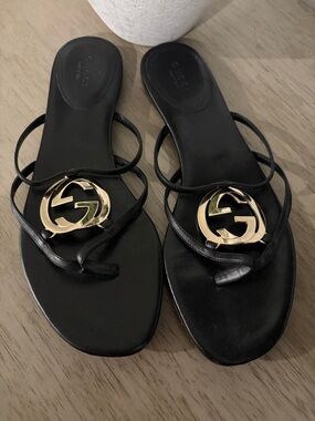 Gucci Black Leather Sandal with Gold Logo Medallion
